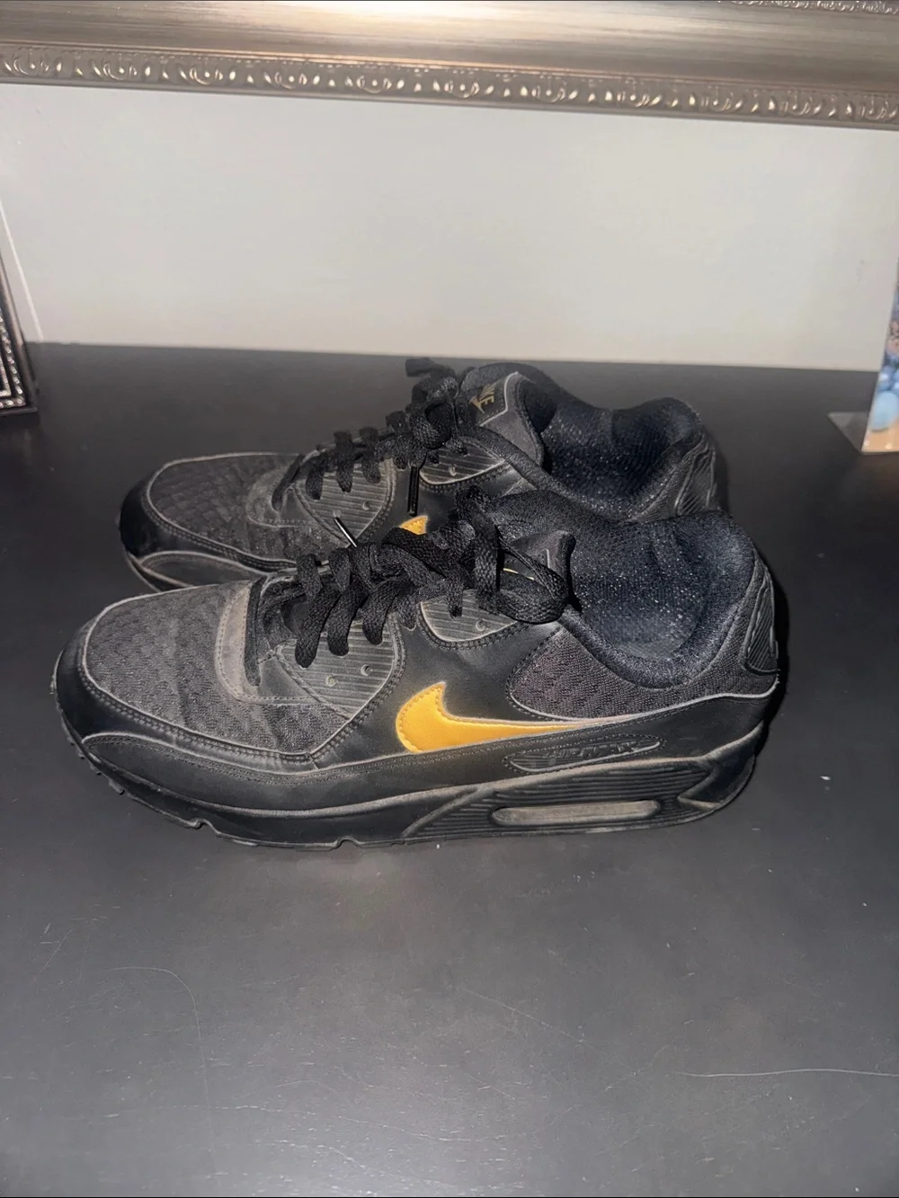 Nike Men's Black Sneakers with Gold Swoosh